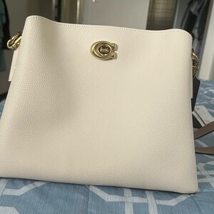 Coach purse cream and beige colors